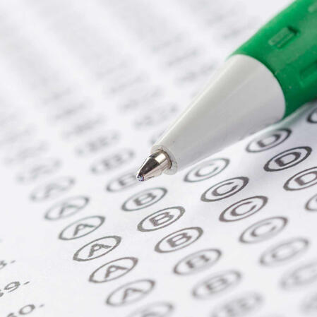 exam preparation materials - multiple choice test with pen